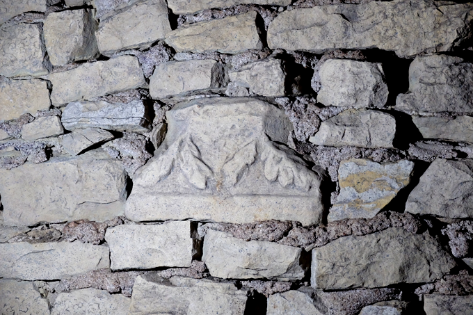 stone ornament in crypt wall