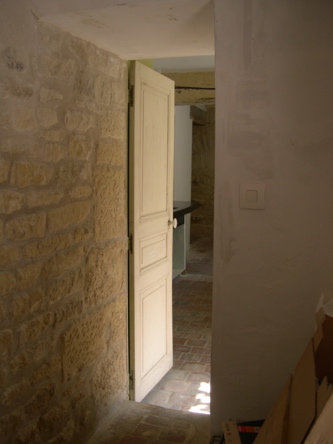 passageway between kitchen and shower-toilet