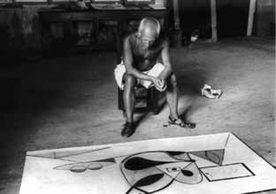 Pablo Picasso in his studio